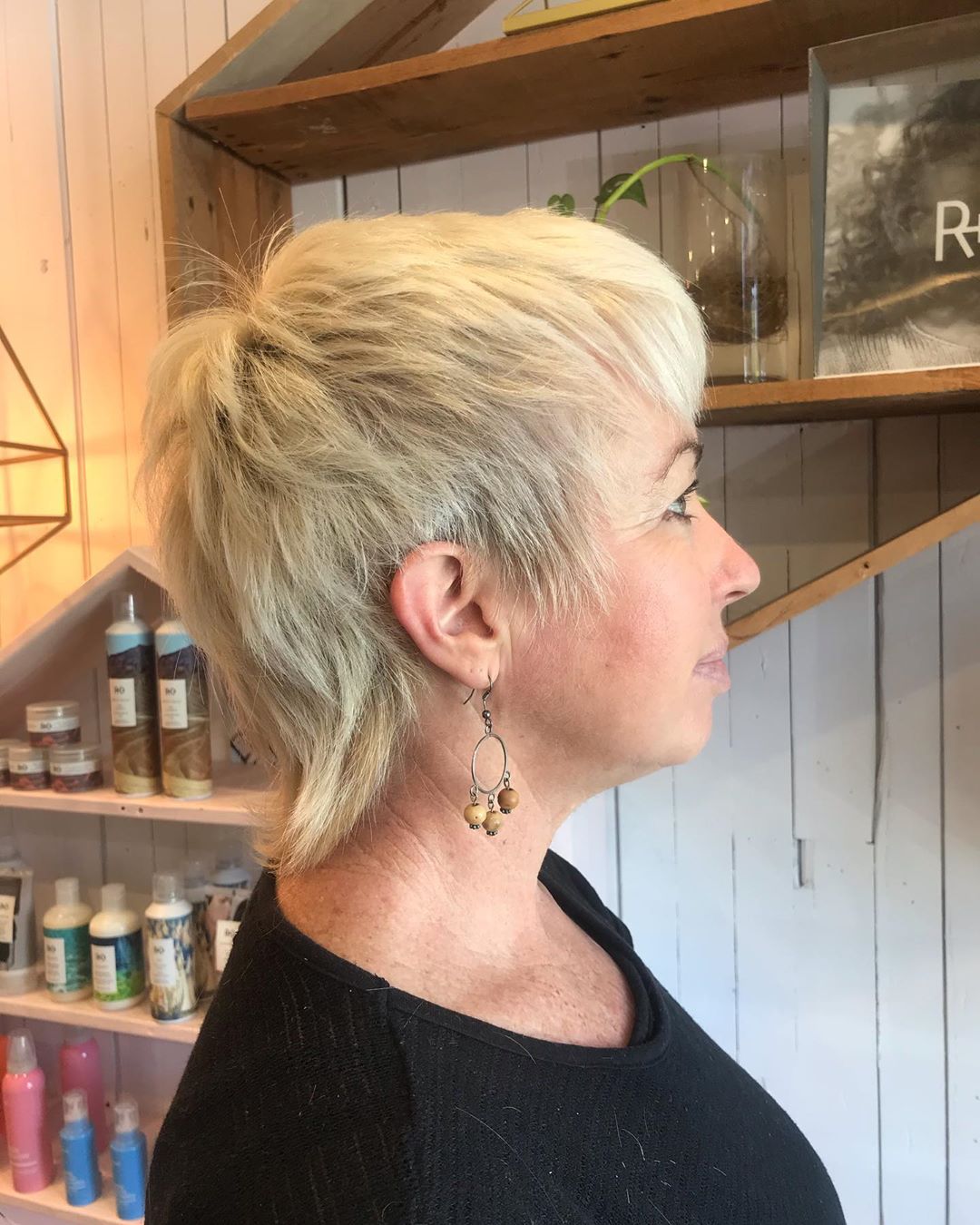 woman in her fifties and fine hair with a very short shag haircut