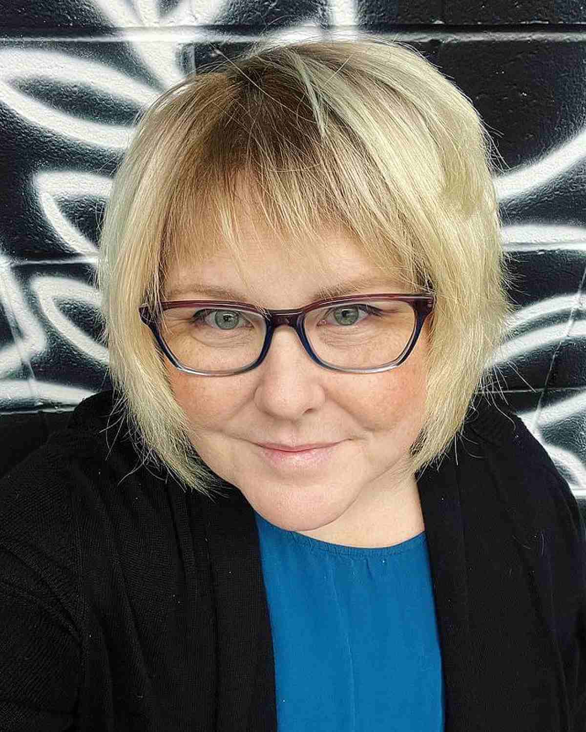 woman over 50 with choppy bixie cut