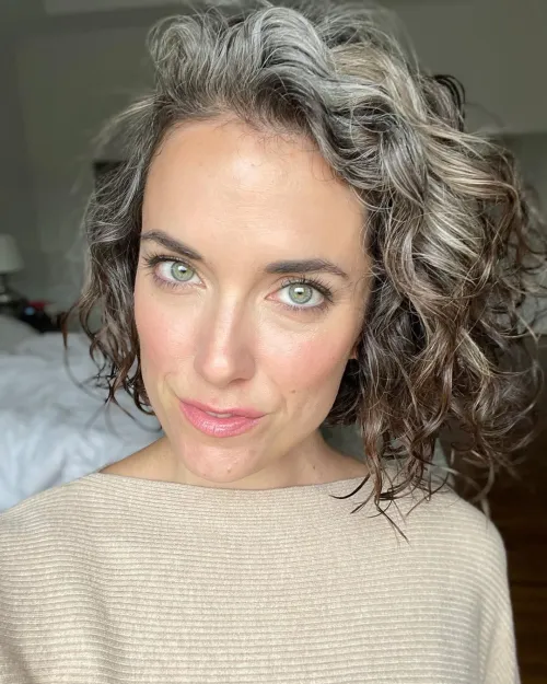5 grombre hair cut in a long curly bob