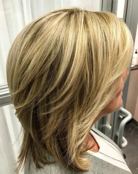 Medium Blonde Balayage Hairstyle with Dynamic Layers