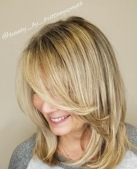 Medium Cut with Long Feathered Bangs