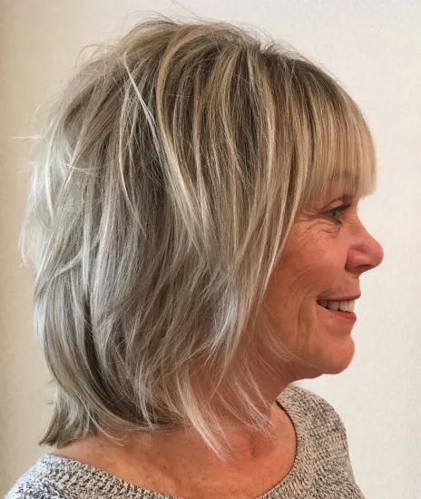Neck Length Shaggy Cut with Blunt Bangs