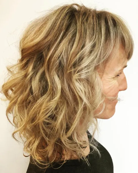 Over 50 Medium Curly Hairstyle with Bangs