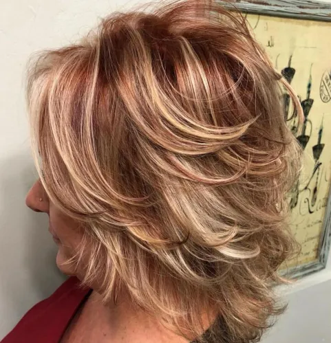 Shorter Feathered Red and Blonde Hairstyle