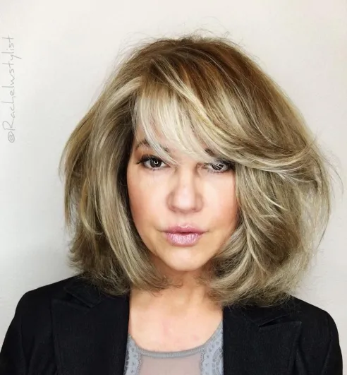 Voluminous Dark Blonde Bob with Bangs