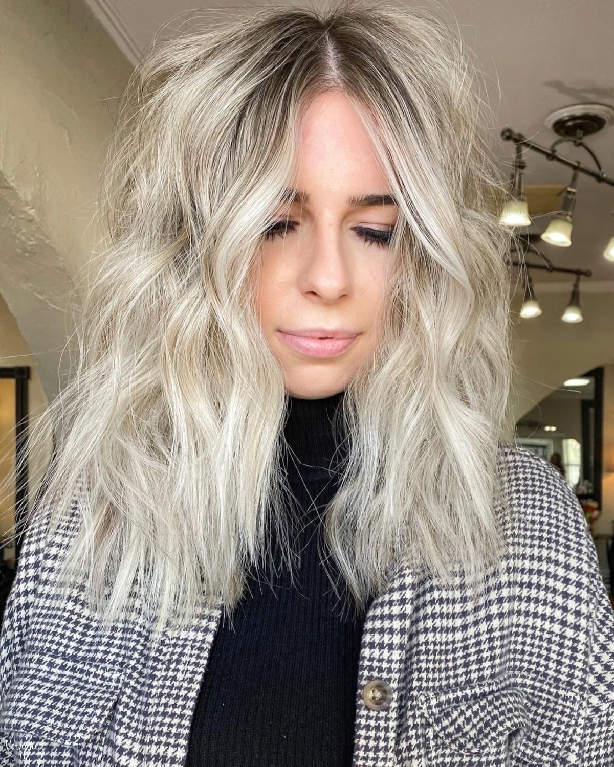 a cool center part shag with choppy layers