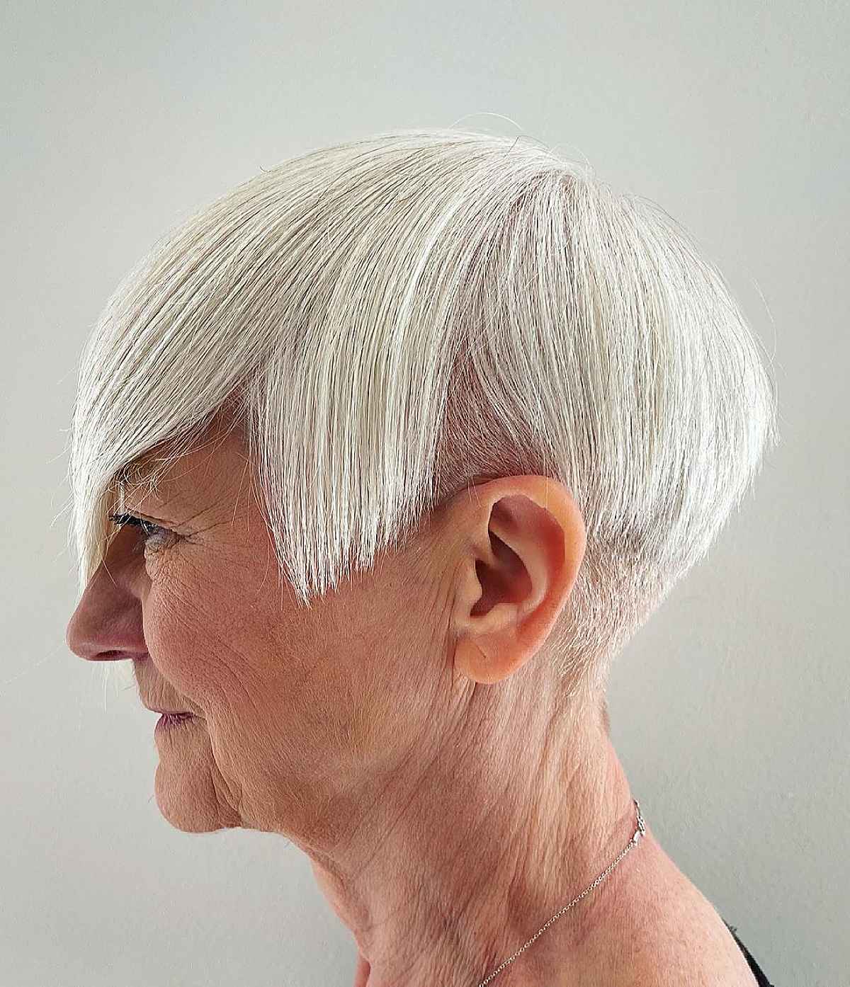 a wedged hairstyle with an undercut on a sixty year old woman