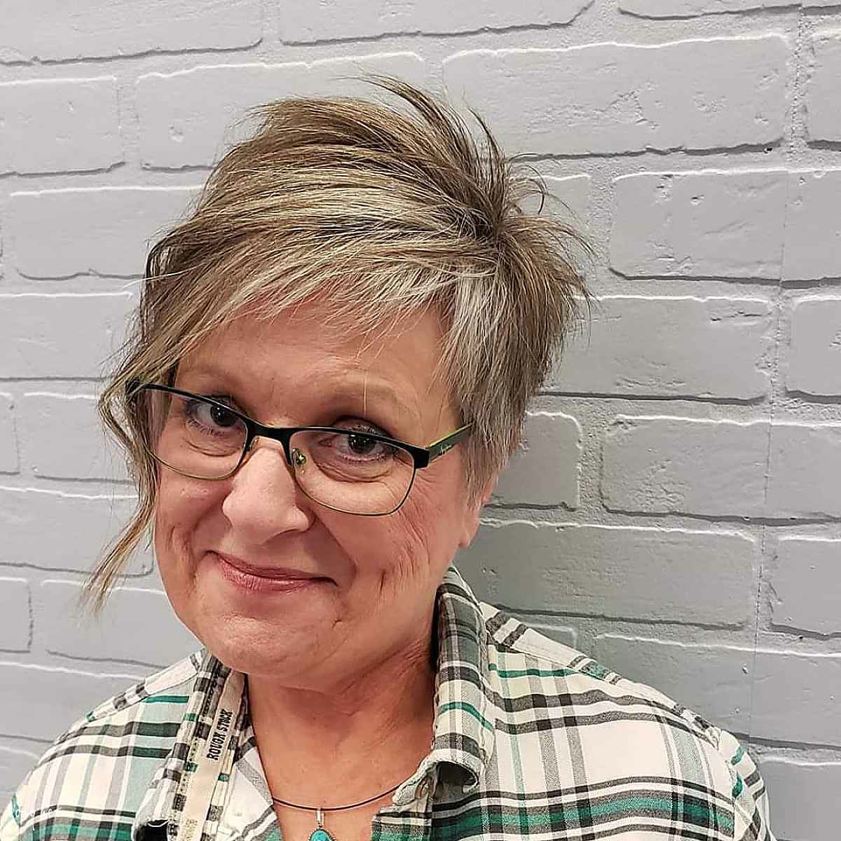 asymmetrical pixie for older women with chubby faces