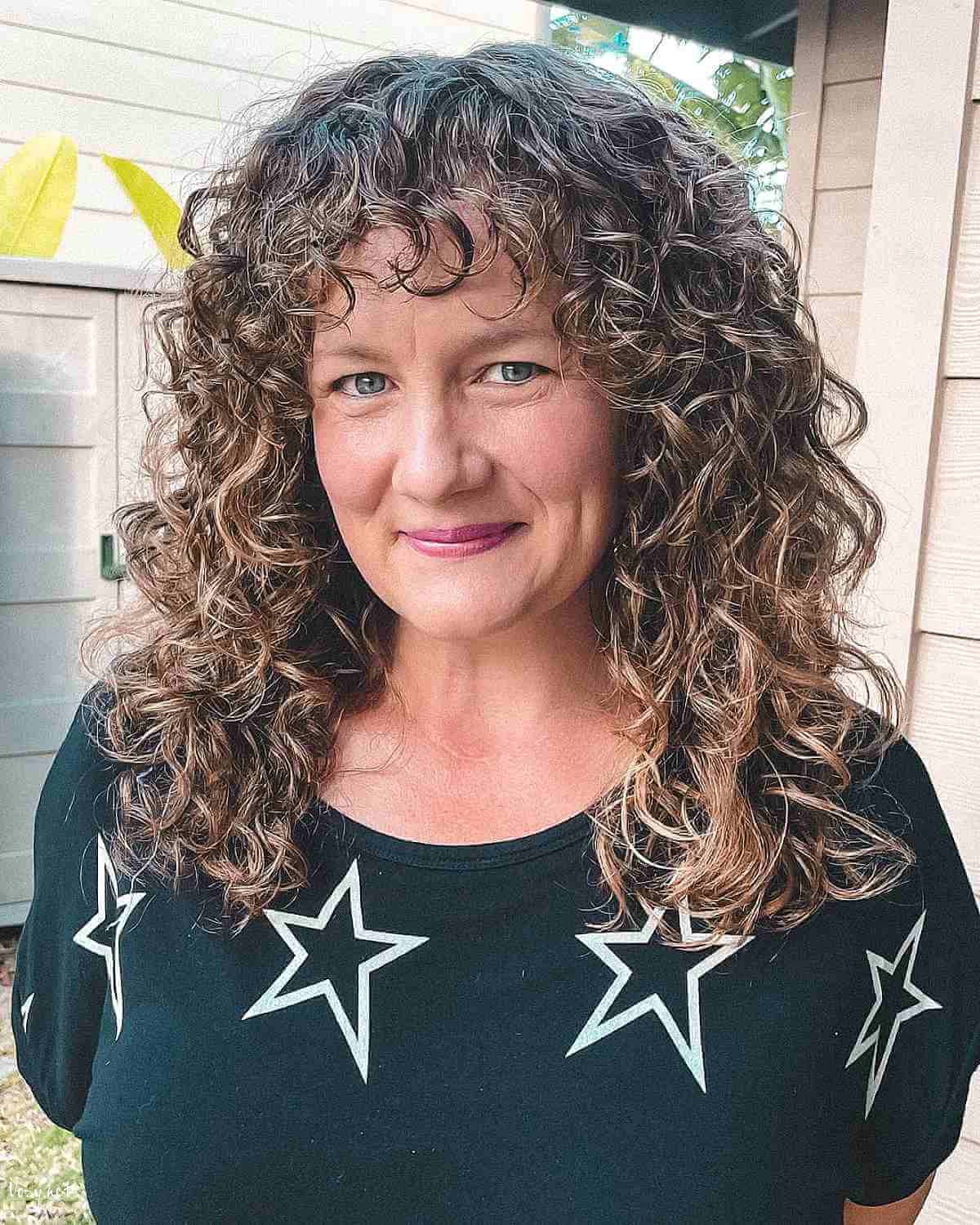 below the shoulder shaggy curly cut for 50 year olds 1