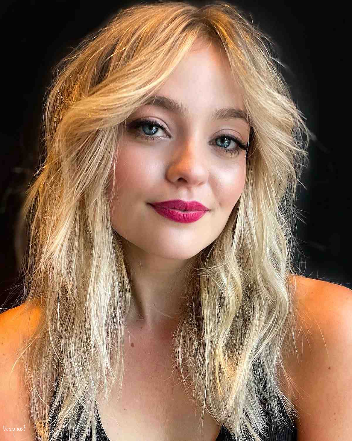 blonde medium length shaggy cut for women with thin hair