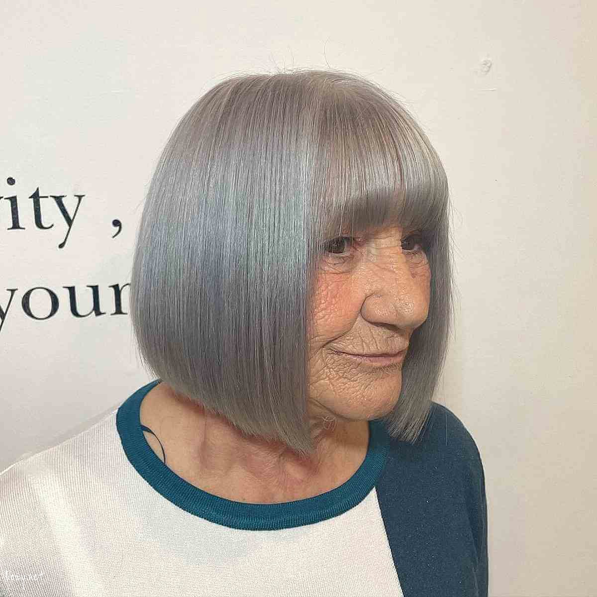 blunt bob cut with full bangs for older ladies fifty and up
