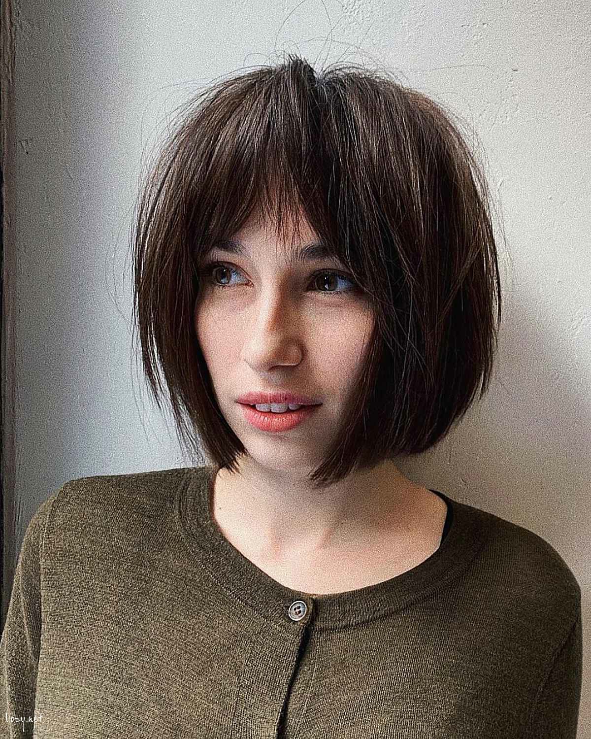 bob with layers and curtain bangs