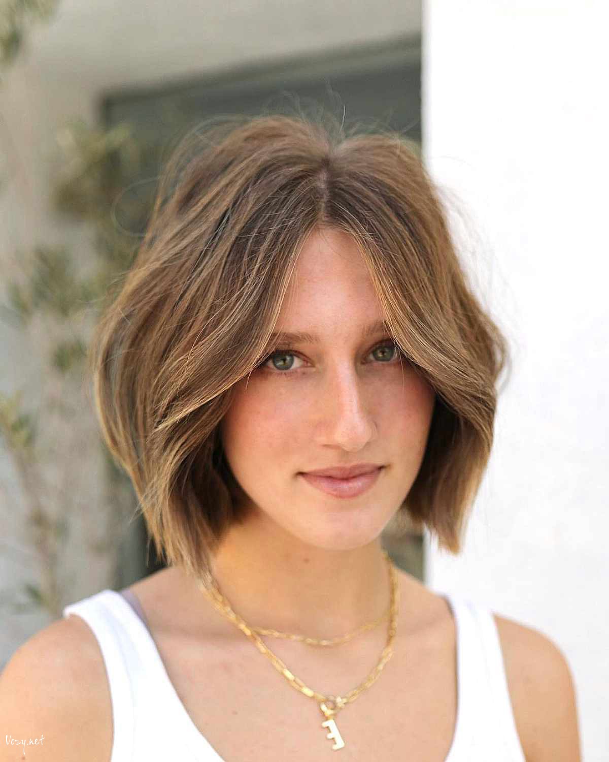 chic medium blonde bob with curtain fringe