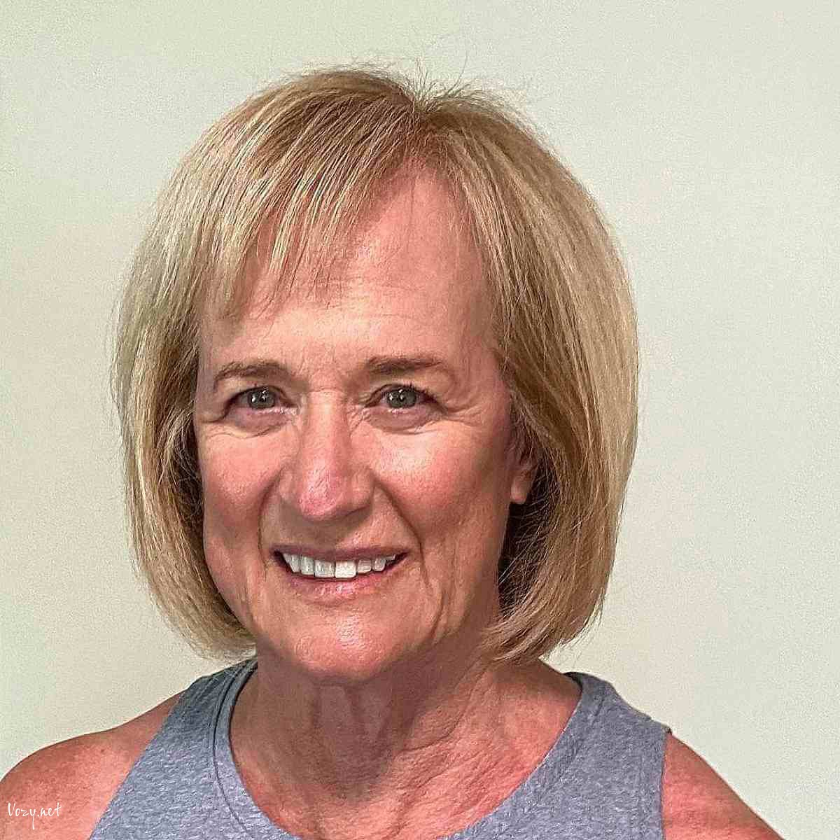 chin length bob cut with short side bangs for ladies over fifty