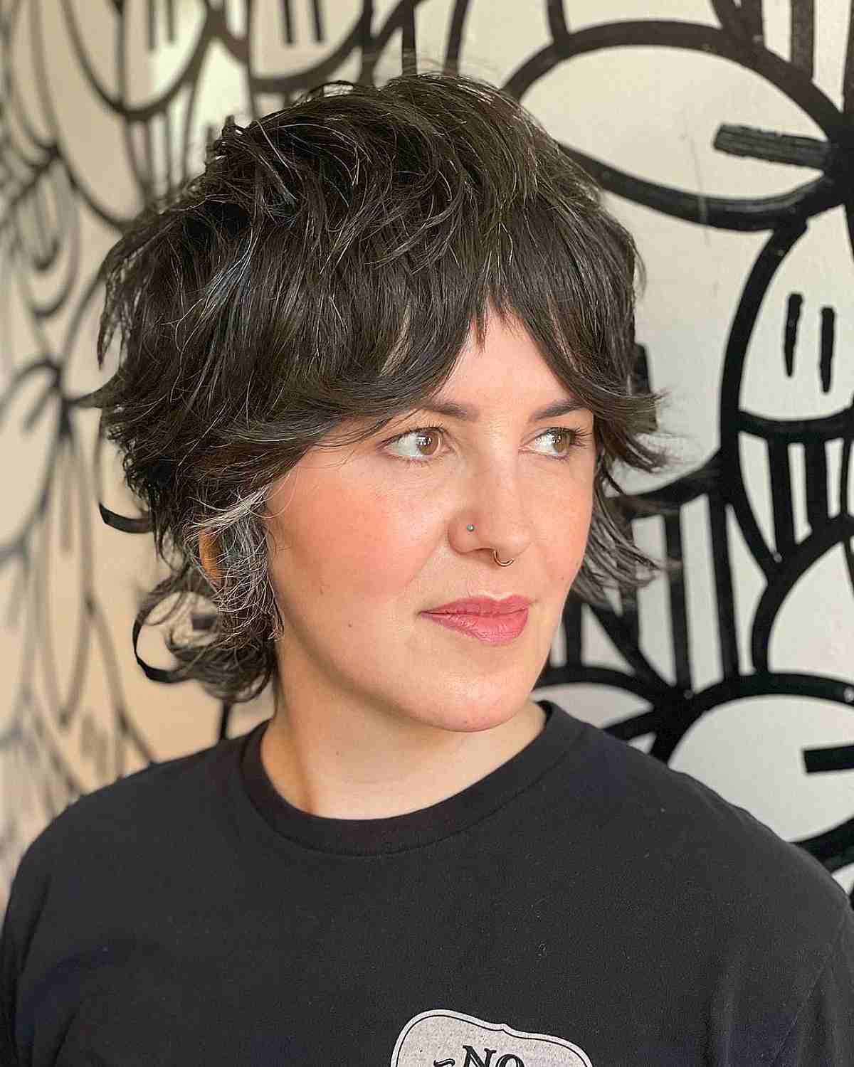 chin length choppy shag with curtain bangs
