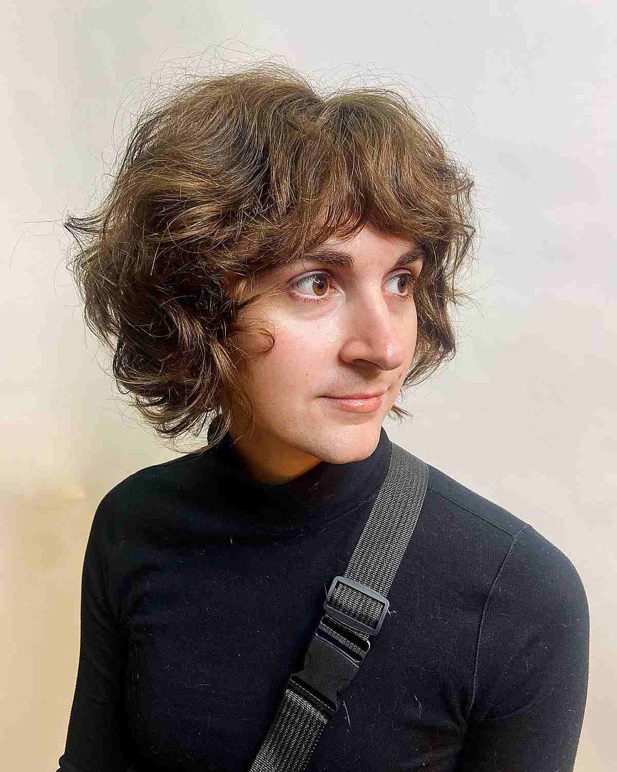 chin length fluffy shagged bob with face framing layers