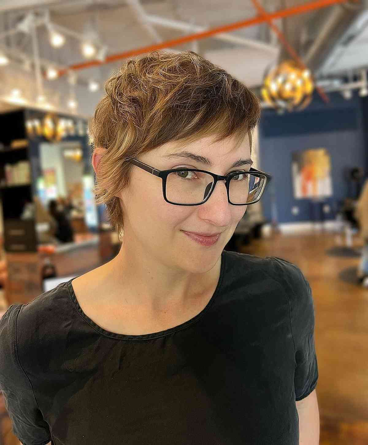choppy pixie with side swept bangs wash and go hairstyle