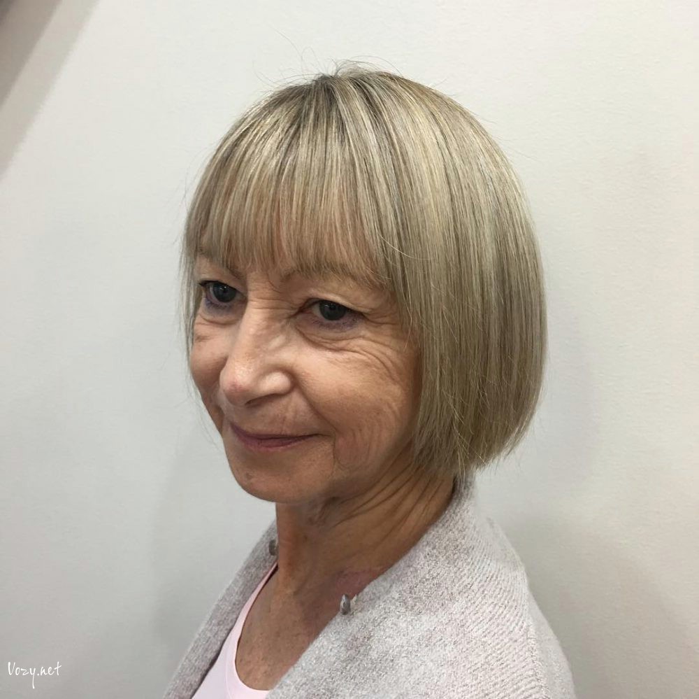 choppy silver bob for ladies over 50 with a round face