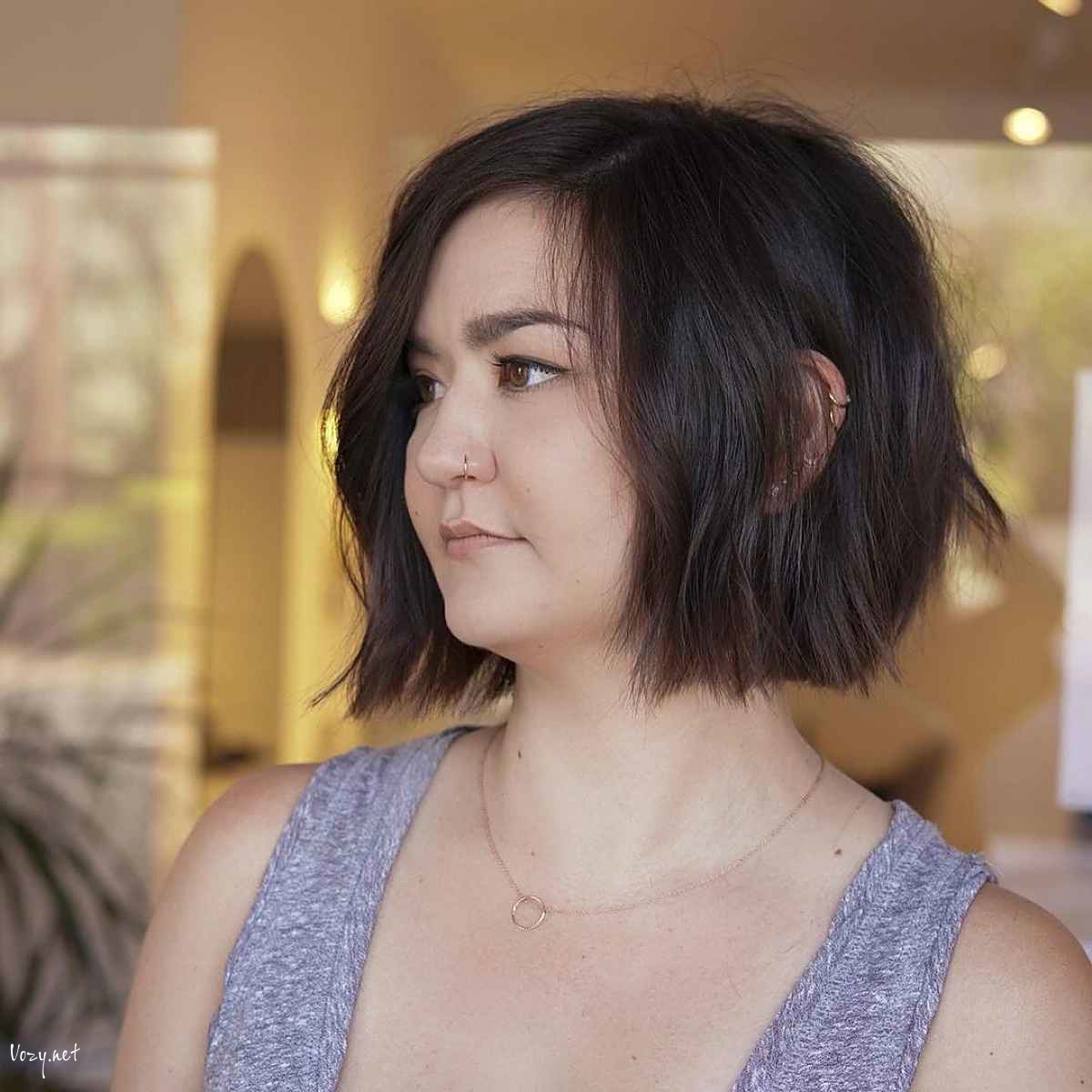 choppy wavy side parted bob cut