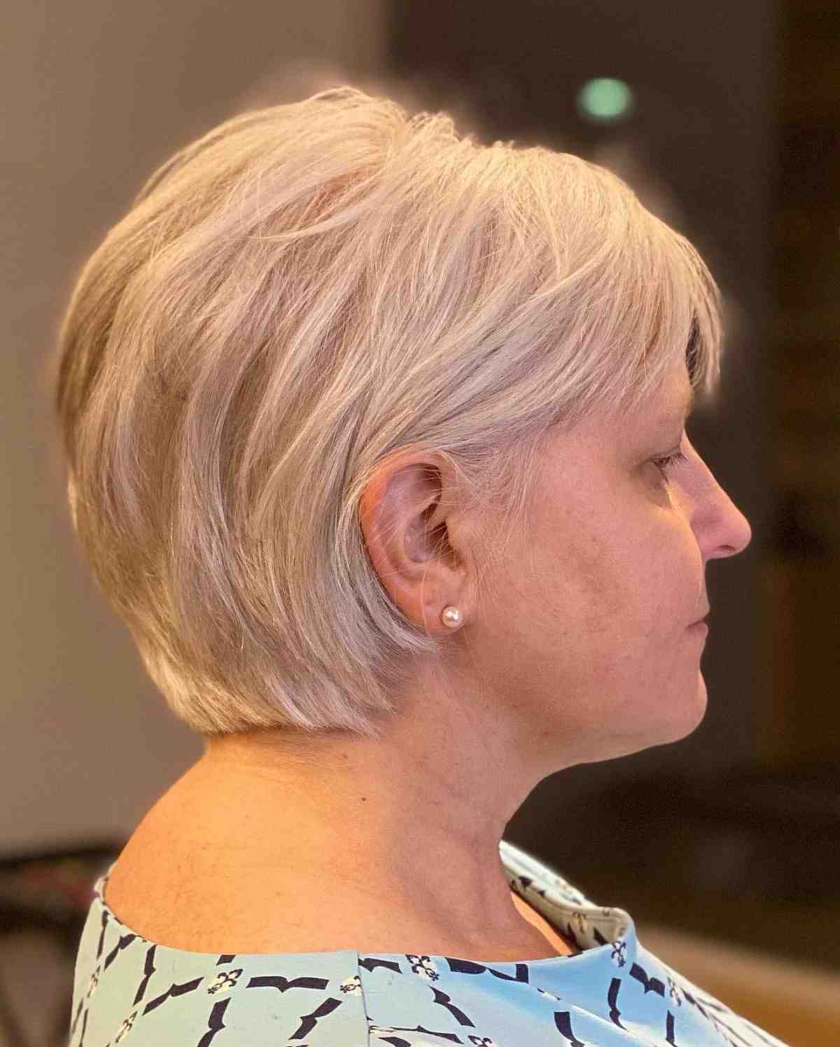 concave bixie haircut with subtle layers for 50 year old women