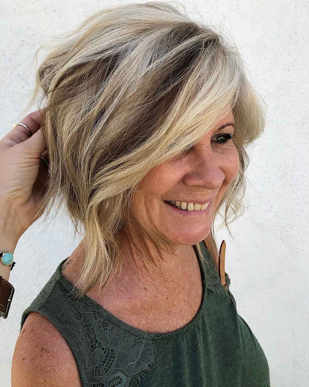creamy blonde with dark brown lowlights fall hair color for older women
