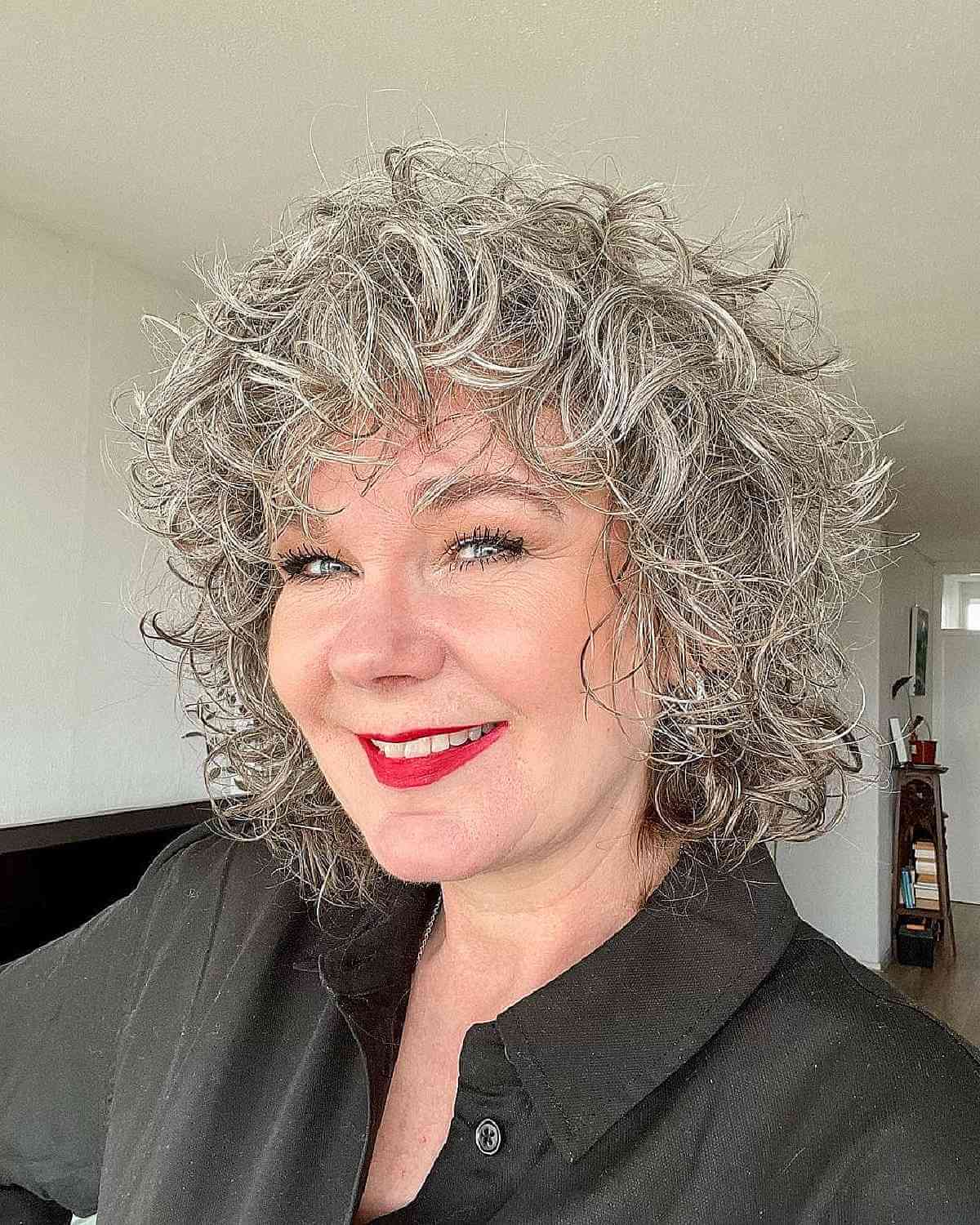 curly shag cut for ladies in their 50s with square faces