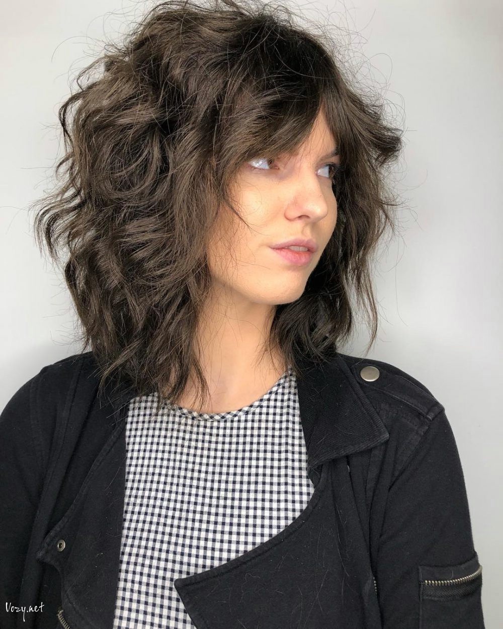 cute shaggy cut for short curly hair