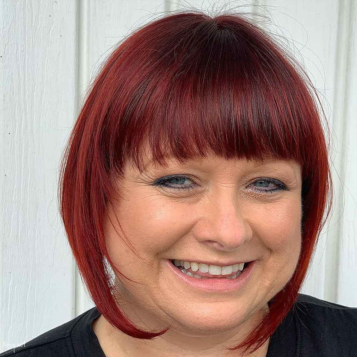 cute short bob cut with bangs for women over 50