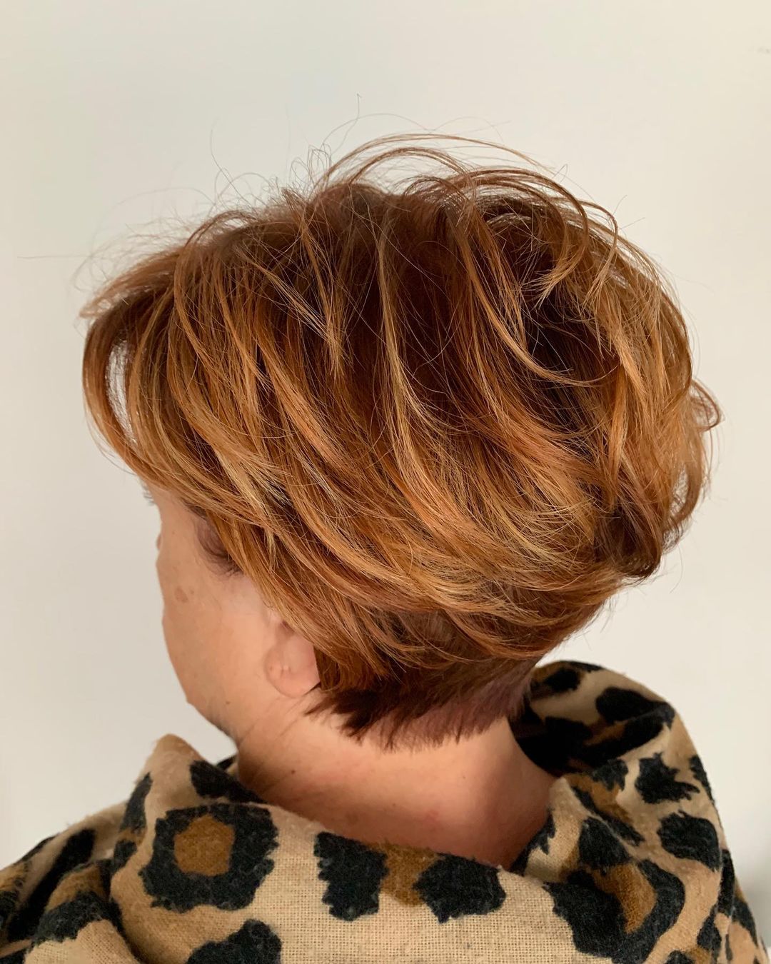 dimensional burnt orange hair for 50 year old woman
