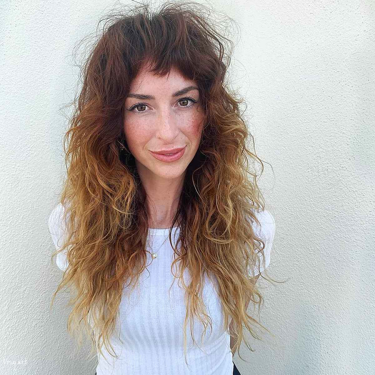 edgy wolf cut for wavy hair