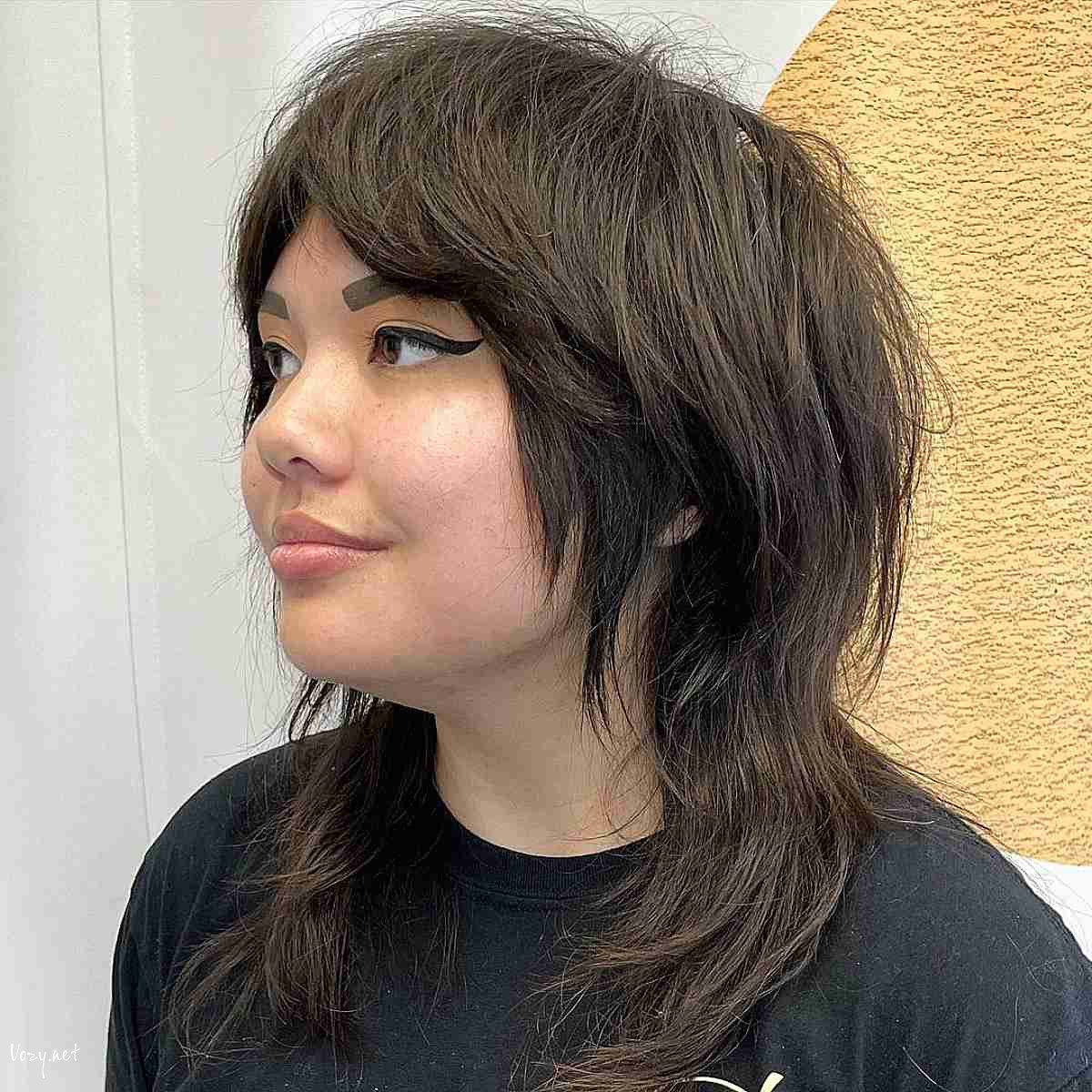 face framing layers on a shaggy wolf cut