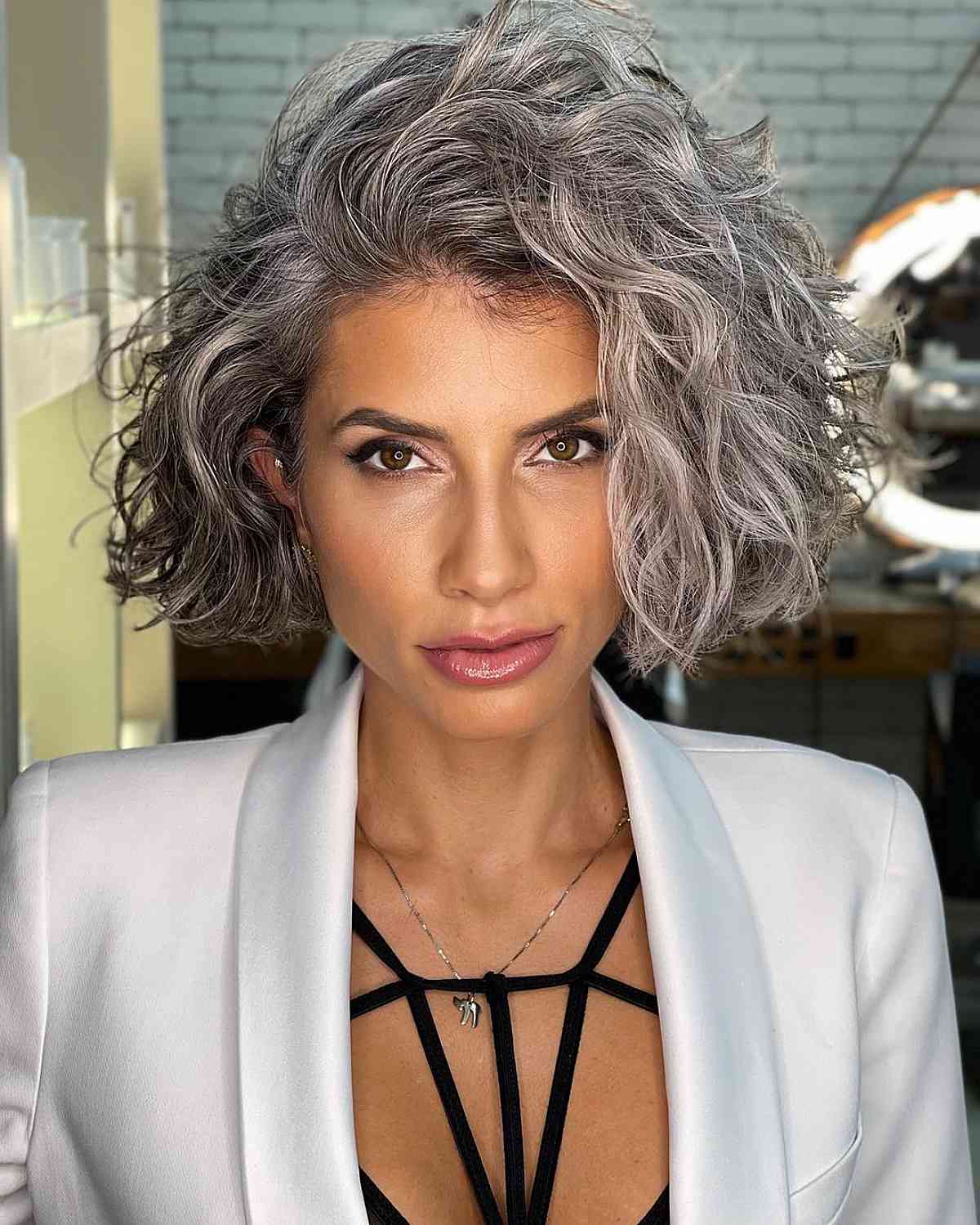feathery curls short haircut for women over 40