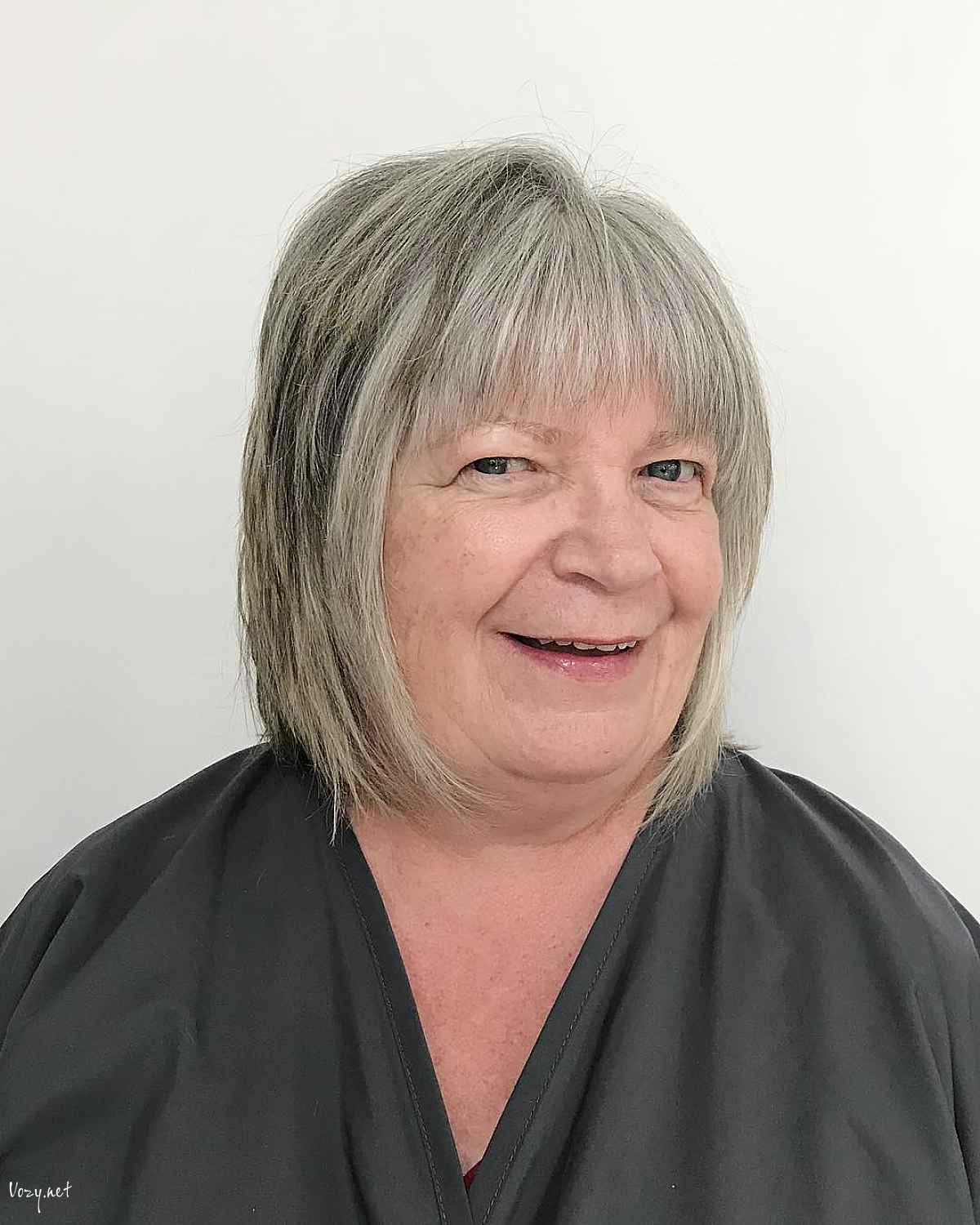 flattering lob for women over 50 with a full face