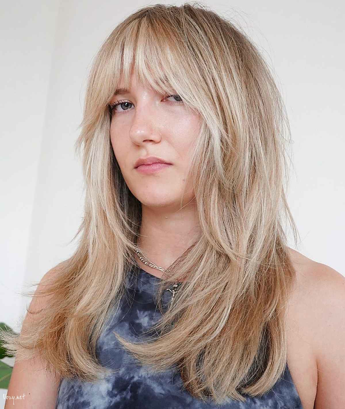 flattering shaggy haircut for round faces 1