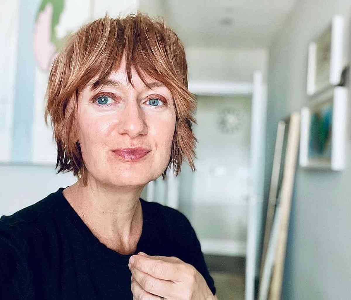 glossy short shag with choppy bangs for women 50 and over