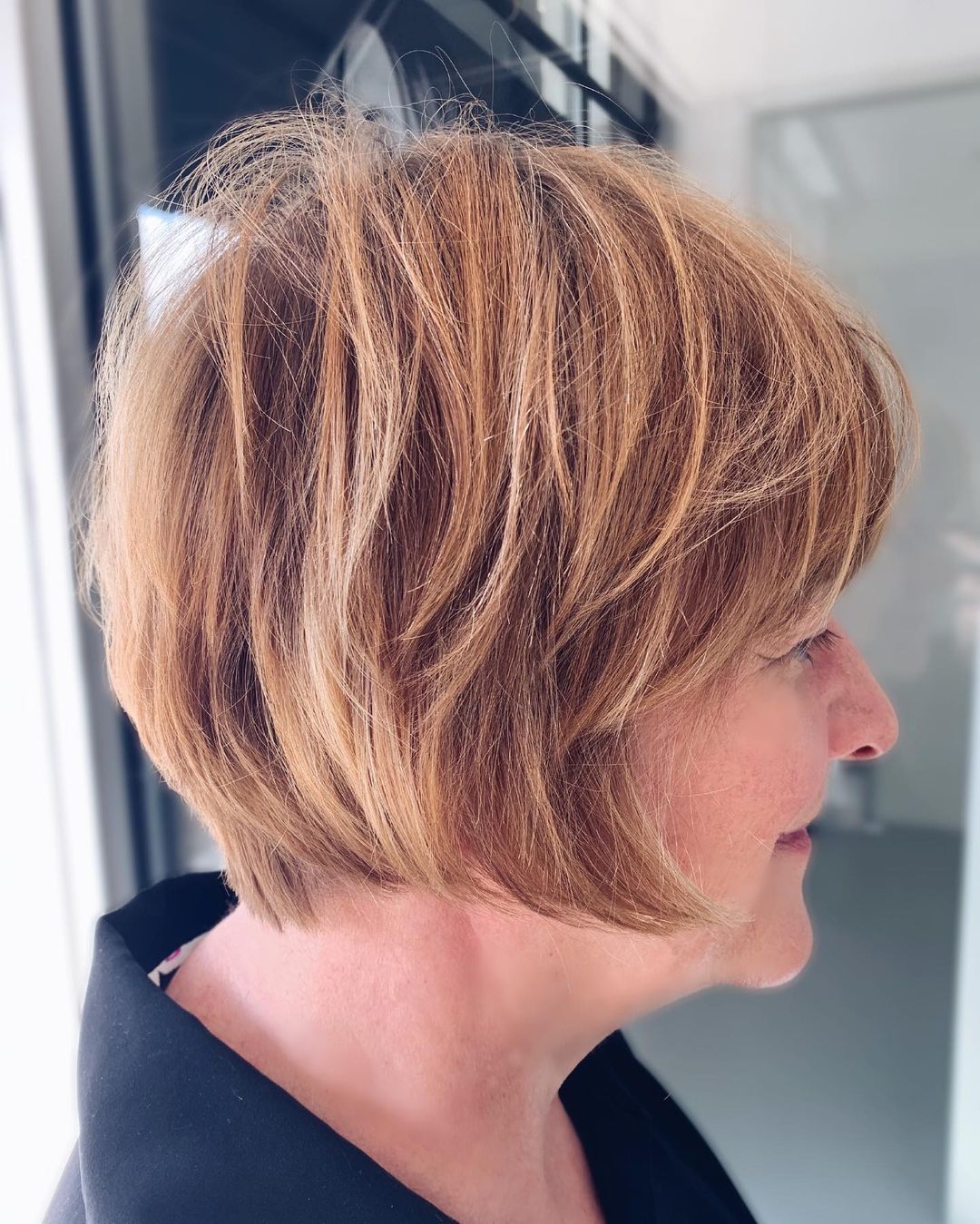 golden toffee hair for women in their 50s