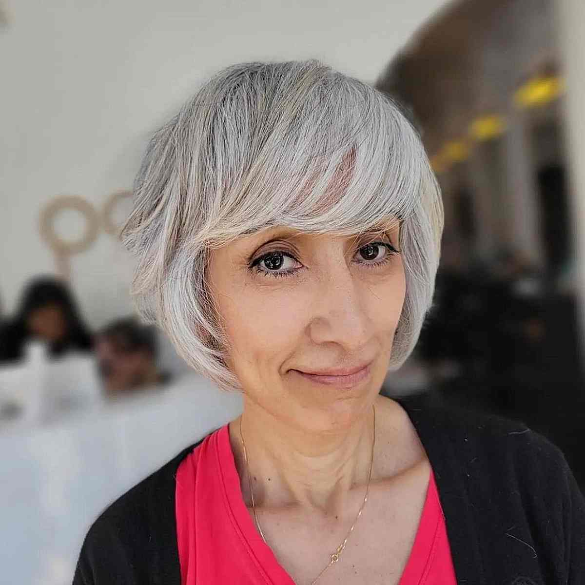 grey bob with full side swept bangs for 50 year old ladies with fine hair