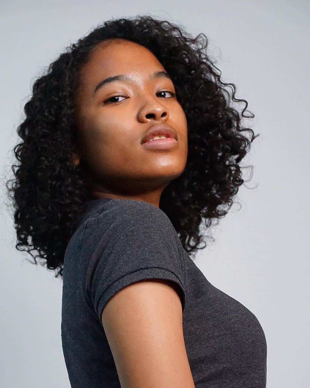 hairstyle for short permed black hair