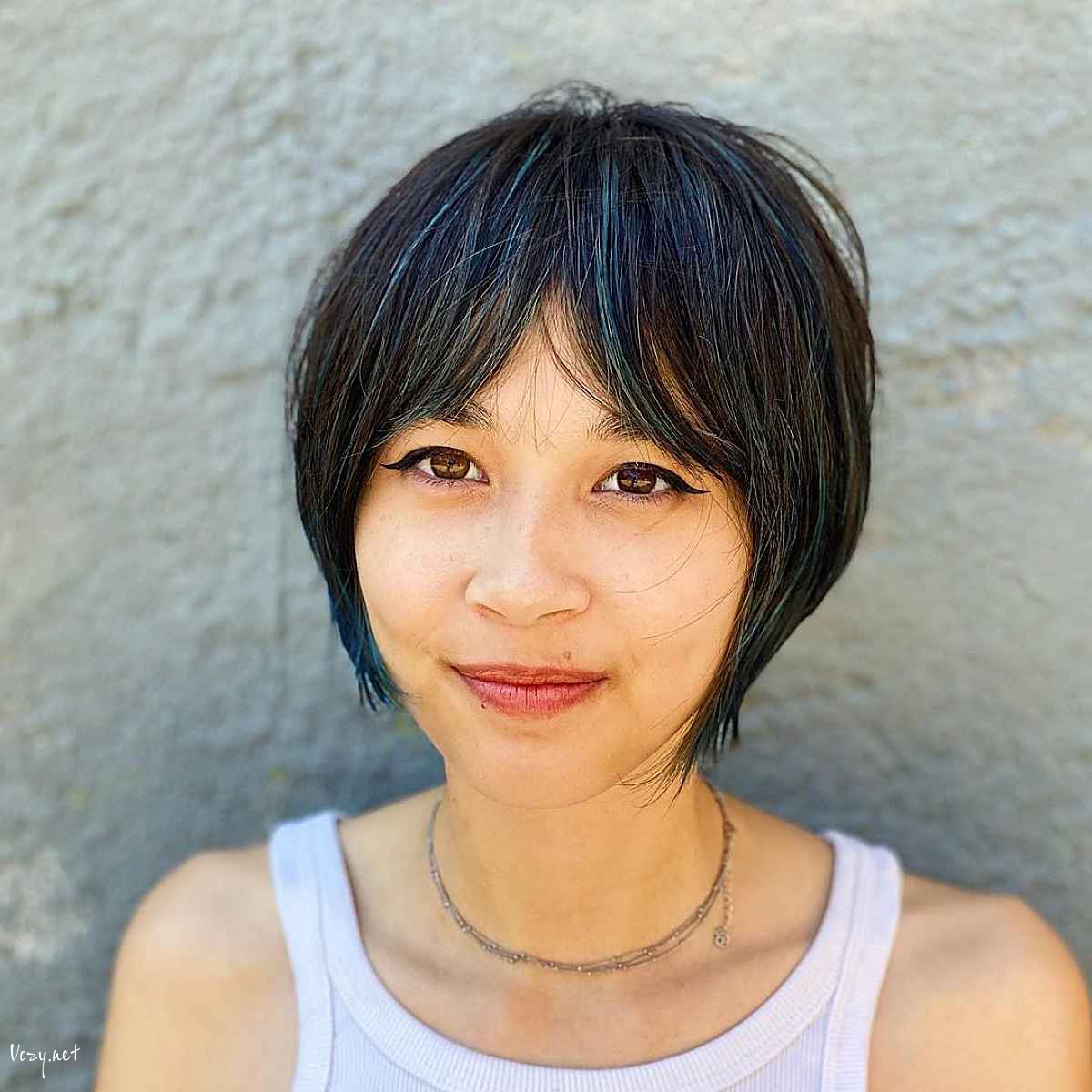 jaw length edgy bob with middle parted bangs