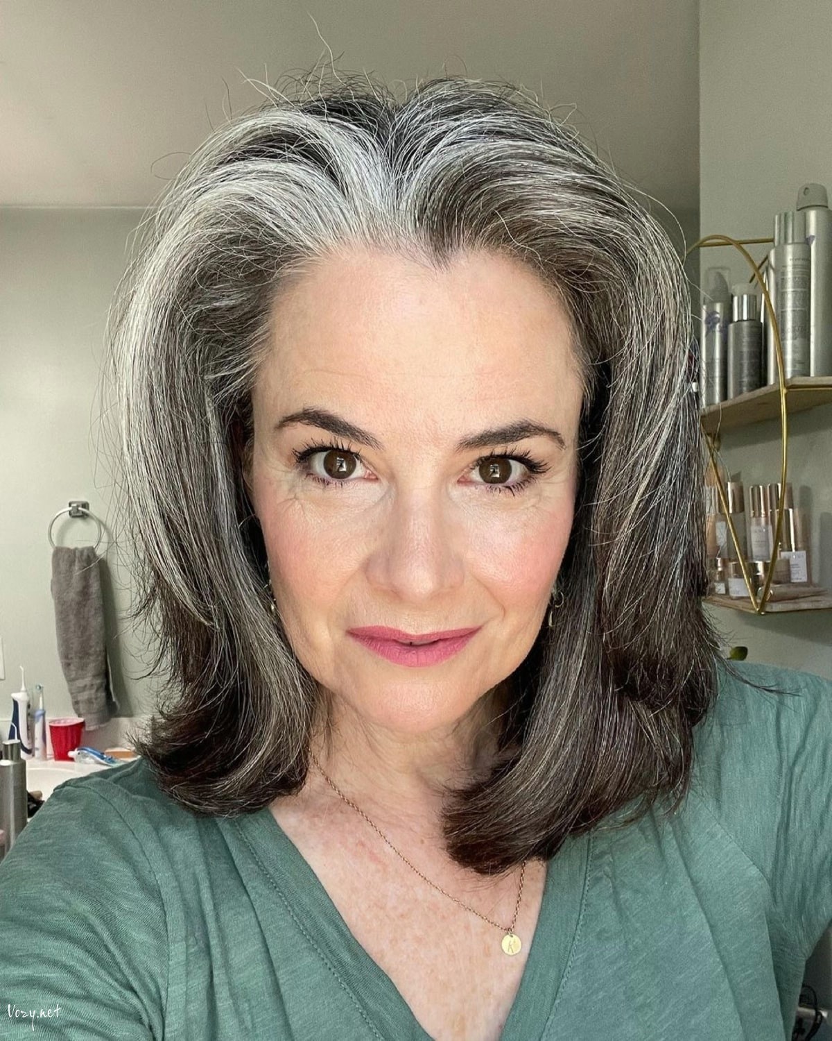 layered long bob cut for women with salt and pepper hair