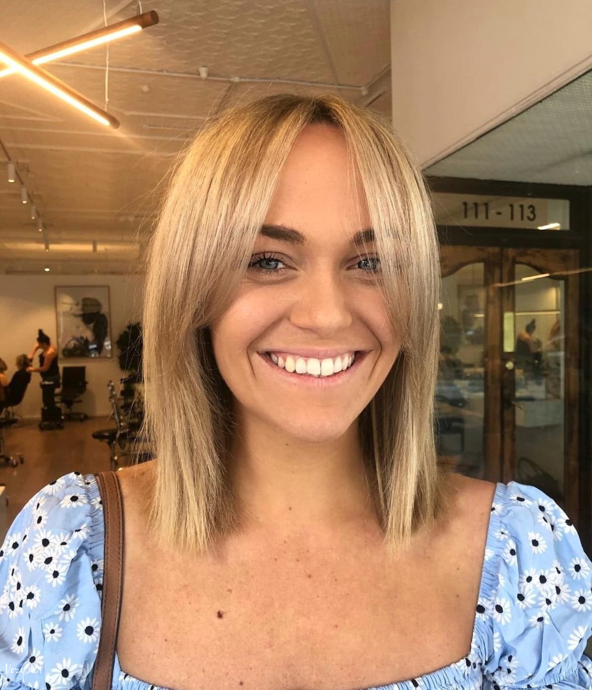 lob with face framing curtain bangs