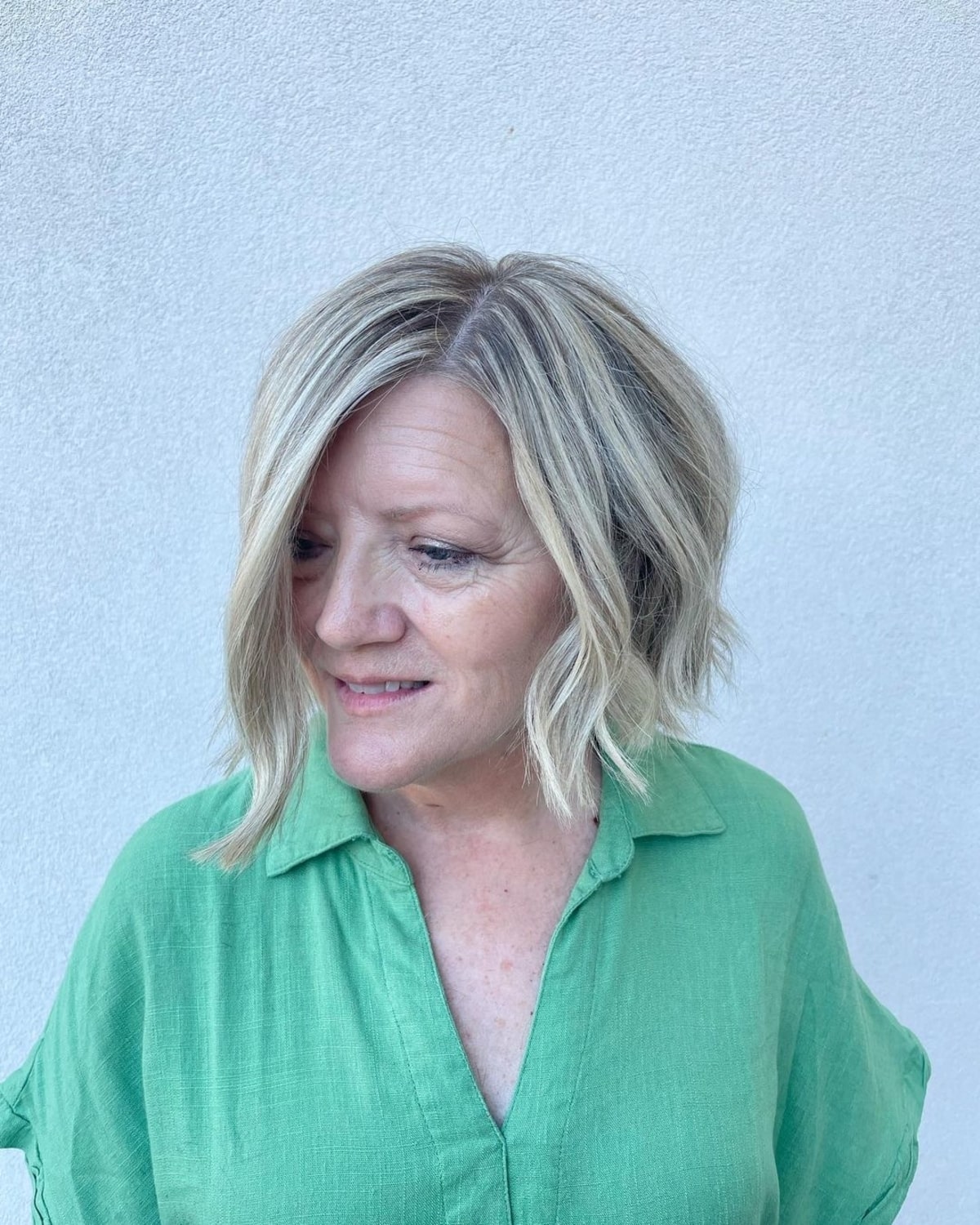 long asymmetrical hairstyle for mature women