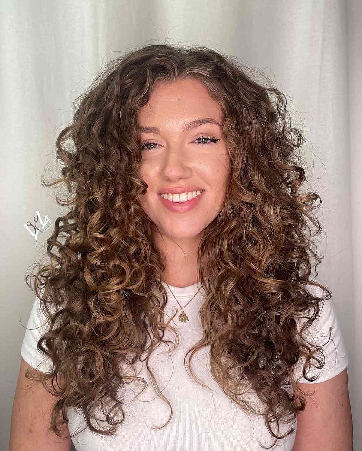 long layered cut for curly hair for a wash and go hairstyle