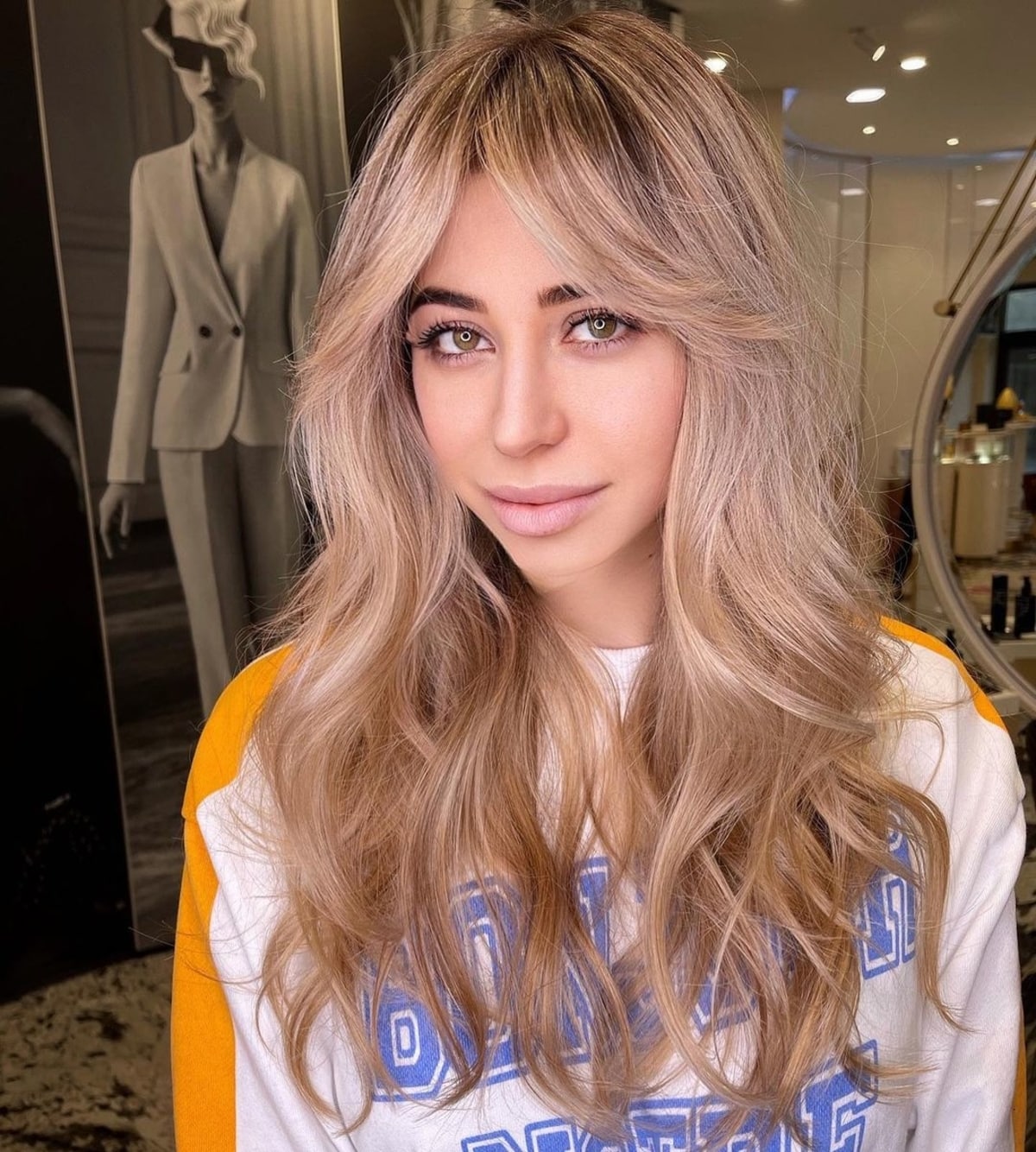 long layered cut with curtain bangs