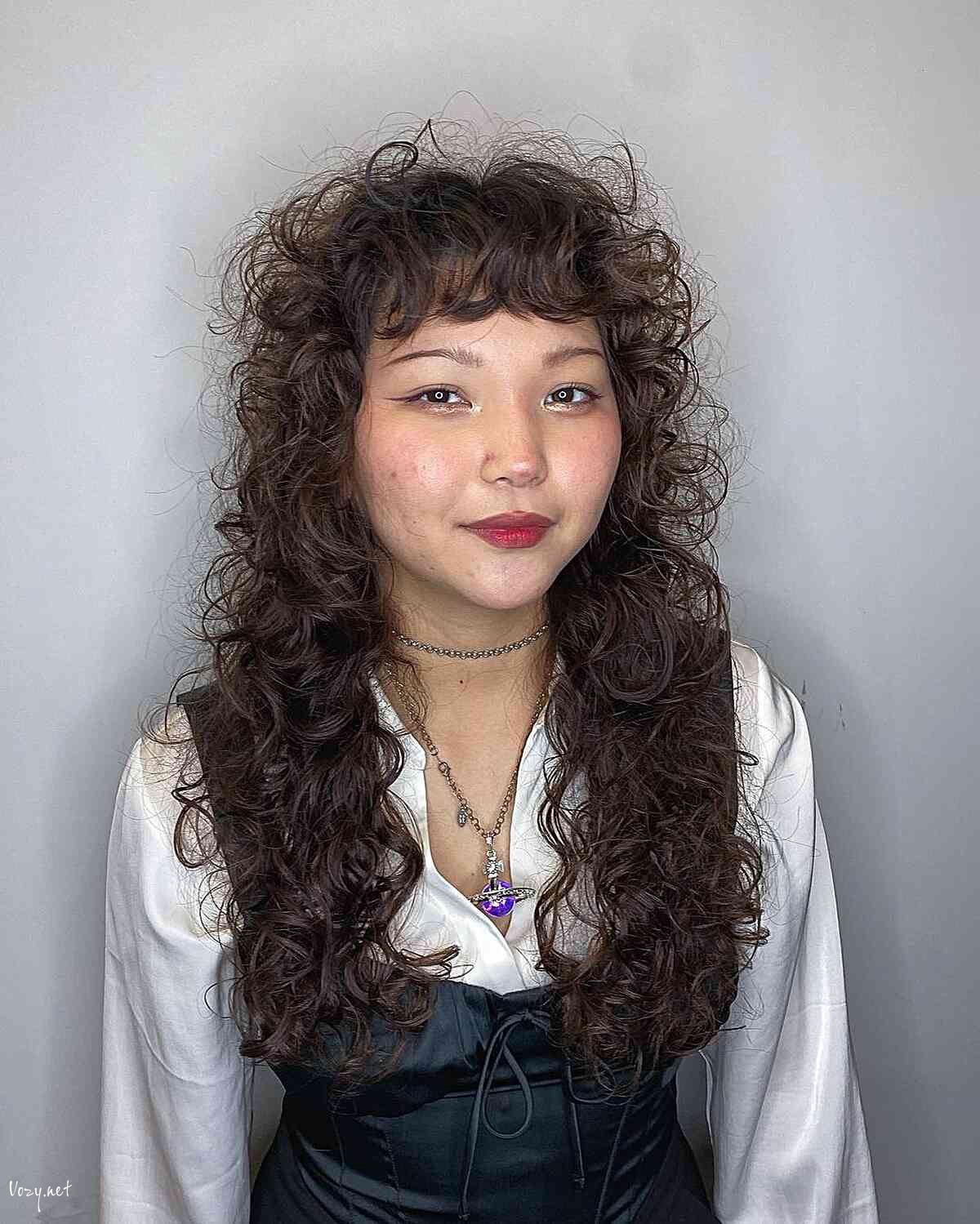 long layered wolf cut with textured curls