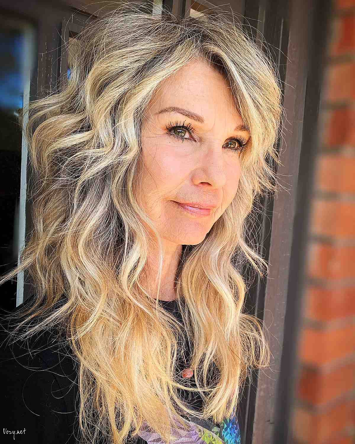 long thick hair with a side part for women over fifty