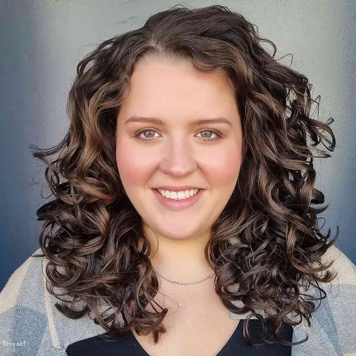 medium length curly hair with a side part