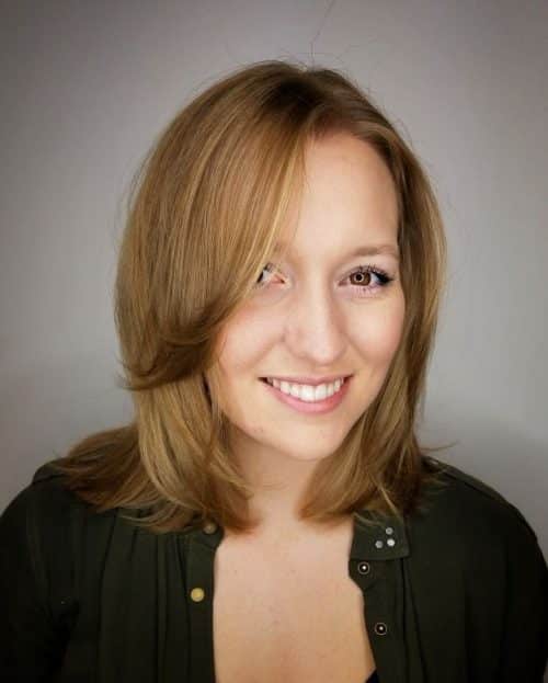 medium length cut with side swept bangs 500x623 1