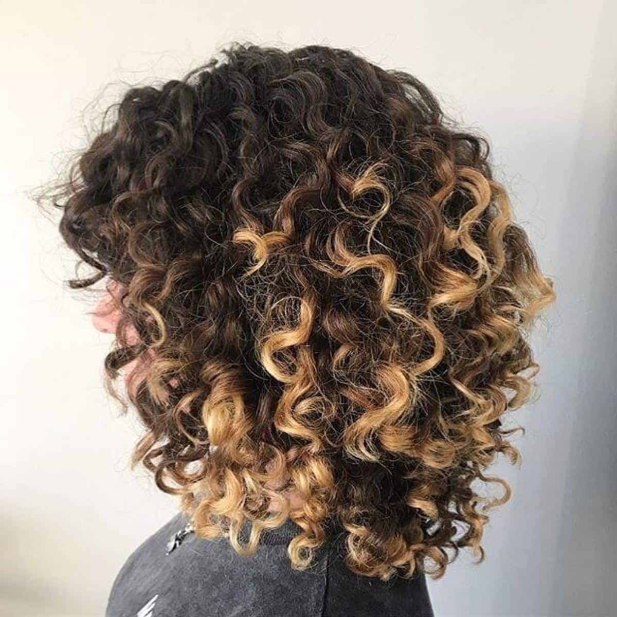 medium length perm with highlights