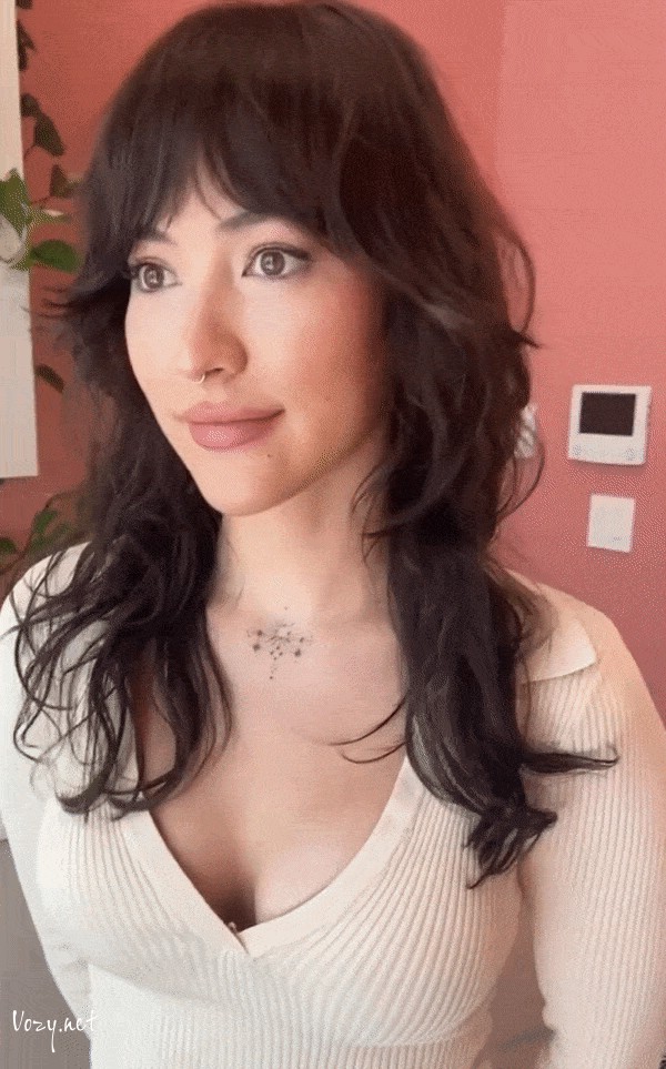medium razor cut shag with curtain bangs
